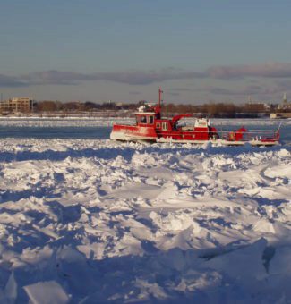 During frigid winter months, the Niagara Queen II icebreaker keeps the water flowing for OPG's hydro generating stations.