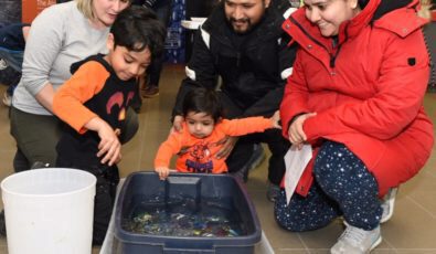 A family takes part in March Break activities.