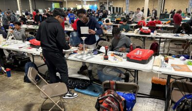 Students design and construct a wind turbine model during the Green Energy Challenge at the 2024 Skills Ontario Competition.