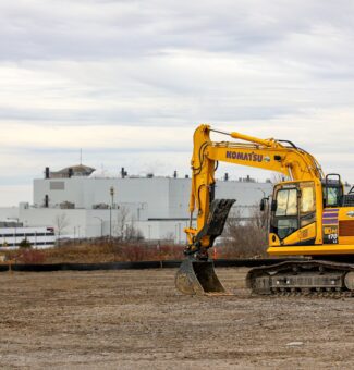 An excavator is seen at OPG's Darlington New Nuclear Project site, future home of Canada's first commercial Small Modular Reactor.