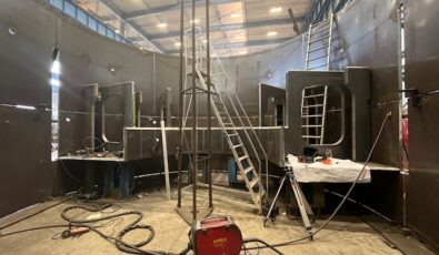 A look at the tunnel boring machine shield under construction. The shield acts as a barrier between the excavated materials in the chamber and the surrounding ground, preventing the entry of soil and water while maintaining the stability of the excavation.